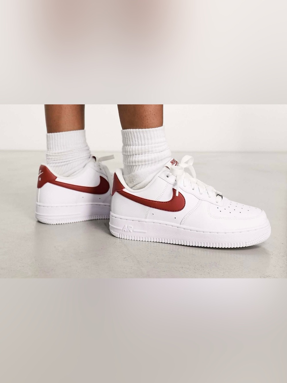 Nike Air Force 1 ‘07 sneakers in white and burned orange